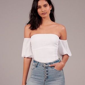 White off the should bodysuit